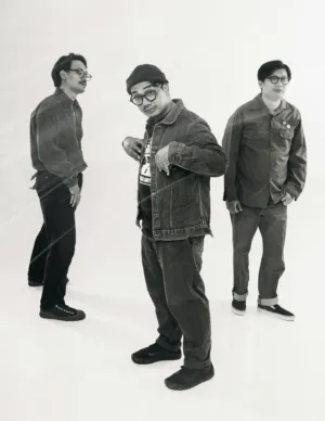 Three Men In Casual Attire