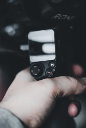 Hand Holding Camera