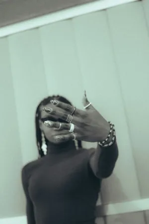 Hand Covering Face