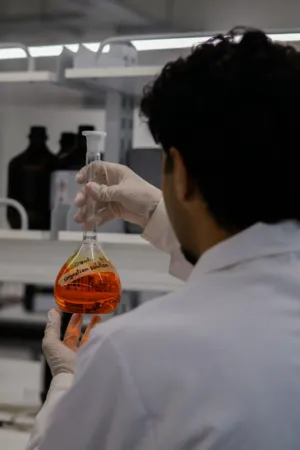 Scientist Examining Solution