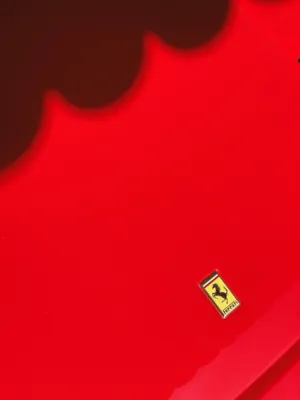 Ferrari Emblem On Red Car