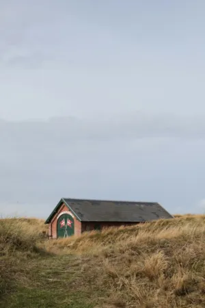 Brick Building In A Field