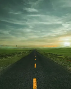 Lonely Road At Sunset