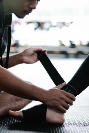 Athlete Wrapping Ankle