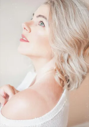 Blonde Woman In White Off-The-Shoulder Top