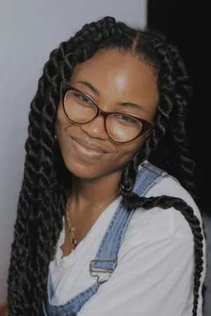 Smiling Woman With Braids