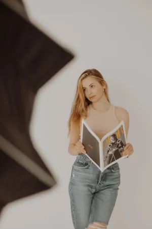 Young Woman With Magazine