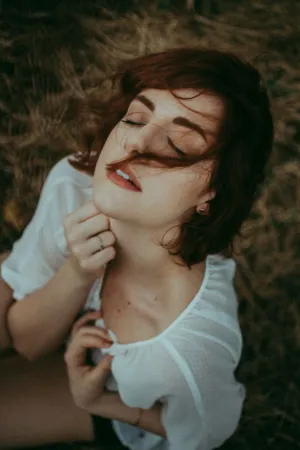 Redhead In White Top