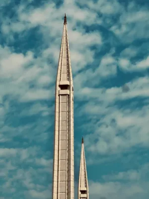 Minaret Against Cloudy Sky