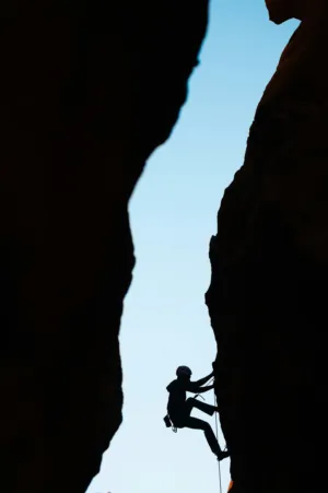 Silhouette Of A Rock Climber