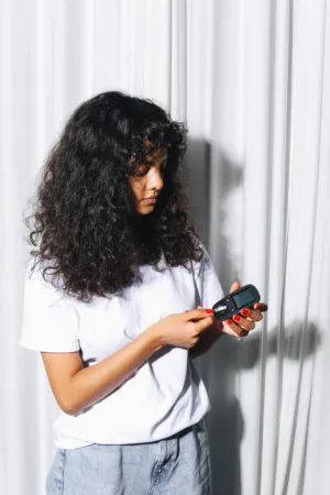 Young Woman With Glucose Meter