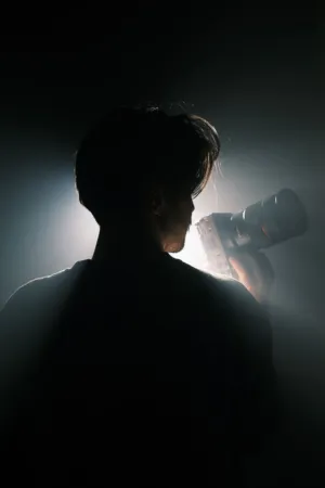 Silhouette Of A Photographer