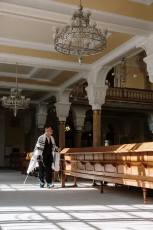 Man In Prayer Shawl In Synagogue