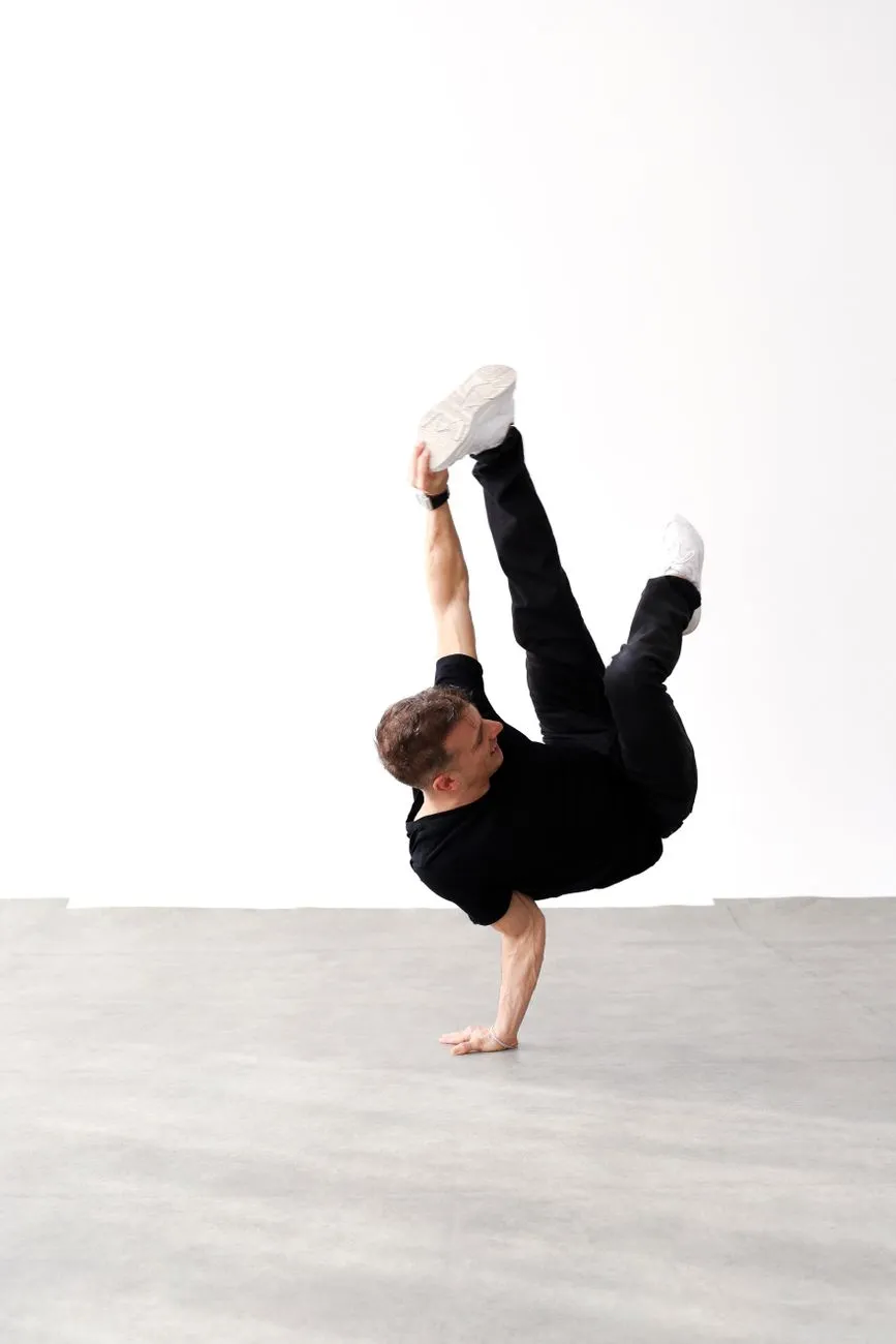 Man Performing A Handstand