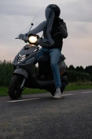 Motorcycle Rider At Dusk