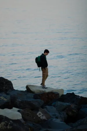 Solitary Figure By The Sea
