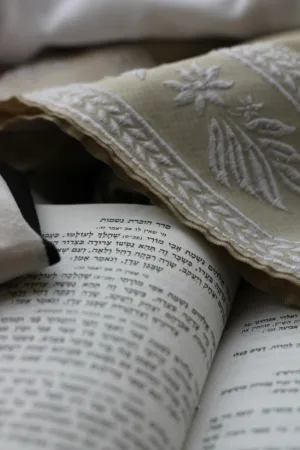 Open Book With Embroidered Pillow