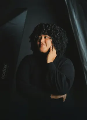 Portrait Of A Woman With Curly Hair